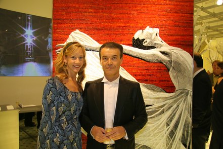 NYCB dancer Maria Kowroski with Maurizio Placuzzi in front of mosaic featuring Maria Kowroski