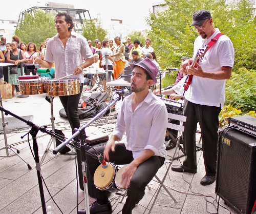 from left to right: Nestor Villar, timbales; David Freyre, bongos; Enrique Breton, bass.