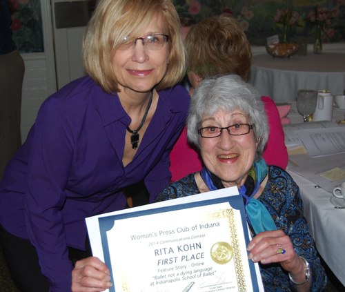 Rita Kohn (right) accepting her award from with Vivian Sade.