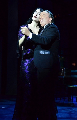 Morticia (Erin Cohenour) and Gomez (Eddie Curry) Addams tango during “Live Before We Die” in Beef & Boards Dinner Theatre’s production of the musical comedy The Addams Family, now on stage through Nov. 22.