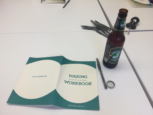 Andrew Simonet's 'Making Your Life as an Artist' Workbook, pens, a bottle opener, and Brooklyn Breweries lager: supplies distributed to attendees at the start of the second evening of DEEP.
