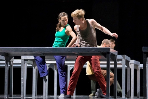 Hubbard Street Dancers Jacqueline Burnett and David Schultz in William Forsythe’s One Flat Thing, reproduced, with, upstage, Jesse Bechard and Michael Gross.