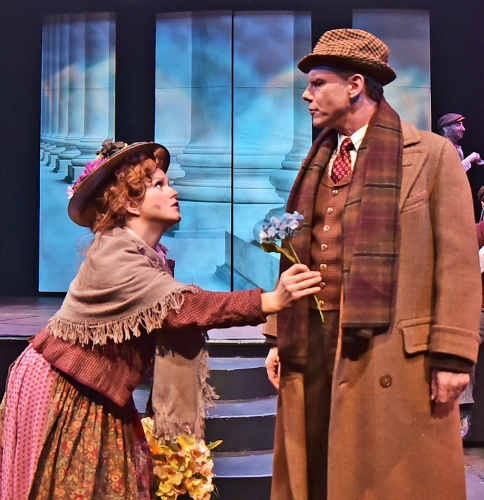 Eliza Doolittle (Kimberly Doreen Burns), left, tries to sell a flower to Professor Henry Higgins (David Schmittou) in Beef & Boards Dinner Theatre’s production of My Fair Lady, now on stage through May 14. The Tony Award winning musical is returning to the Beef & Boards stage after a 20-year hiatus.