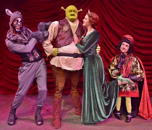 Funny Foursome: Now on stage at Beef & Boards Dinner Theatre, 'Shrek, The Musical' features (from left) Donkey (Julius Thomas III), Shrek (Peter Scharbrough), Princess Fiona (Emily Grace Tucker) and Lord Farquaad (John Vessels).