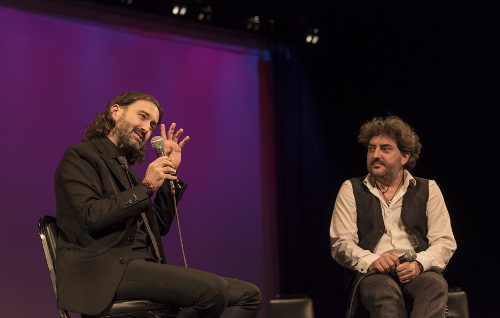 A pre-concert talk with the producer Javier Limón on the left and harmonic player Antonio Serrano on the right.