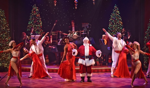 Santa and featured singer Renée Jackson (center) take the stage in the 25th Annual A Beef & Boards Christmas, now on stage at Beef & Boards Dinner Theatre.