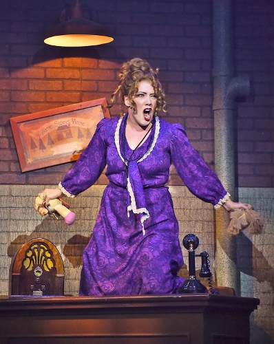 Little Girls1: Miss Hannigan (Kelly Teal Goyette) is distraught over her life that’s filled with “Little Girls” in Beef & Boards Dinner Theatre’s production of Annie, now on stage through July 15.
