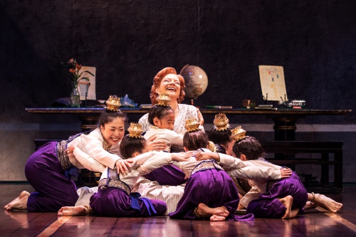 Angela Baumgardner as Anna Leonowens and the Royal Children in Rodgers & Hammerstein's THE KING AND I.