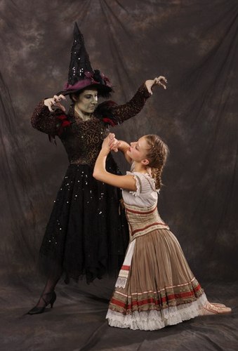 Julie Webb as The Witch and Hannah Wright as Gretel in the Creer-King ballet <i>Hansel and Gretel</i> with costumes by Tutus Divine