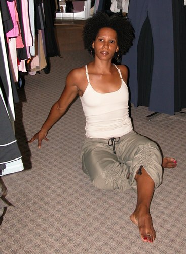 Tan top by Marika. Dark khaki ankle-tie pants by Capezio. Modeled by Kendra Jackson. Available at <a href='http://www.onstagedancewear.com'>OnStageDancewear.com</a>.