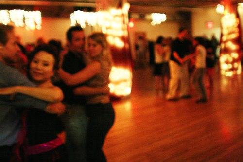 Dancing at Stepping Out Studio's Sundown Party Camera: ISO 3200, 1/125, 1.4, Curves adjusted in Photoshop
