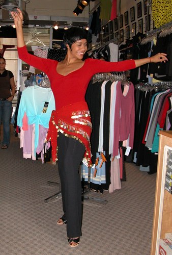 Sleek Red and Black Outfit with a Belly Dance Accent. Modeled by Talia Castro-Pozo. Available at <a href='http://www.onstagedancewear.com'>OnStageDancewear.com</a>.