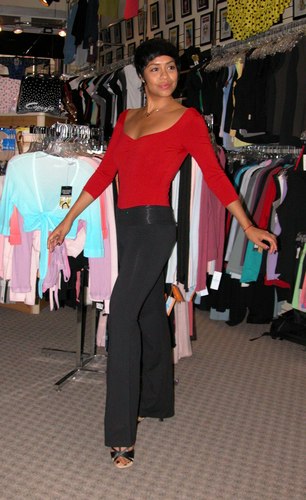 Sleek Red and Black Outfit. Modeled by Talia Castro-Pozo. Available at <a href='http://www.onstagedancewear.com'>OnStageDancewear.com</a>.