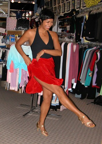 Black and Red Skirt Outfit, Priced to Move. Modeled by Talia Castro-Pozo. Available at <a href='http://www.onstagedancewear.com'>OnStageDancewear.com</a>.