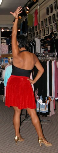 Black and Red Skirt Outfit, Priced to Move. Modeled by Talia Castro-Pozo. Available at <a href='http://www.onstagedancewear.com'>OnStageDancewear.com</a>.
