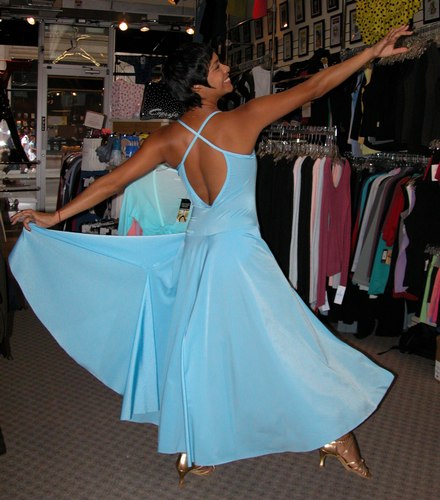 An Electric Blue Dress. Modeled by Talia Castro-Pozo. Available at <a href='http://www.onstagedancewear.com'>OnStageDancewear.com</a>.