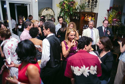 The guests partake of the food (passed around on silver trays no less) and the premium open bar