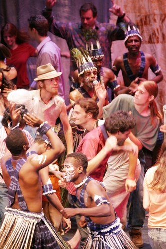Dancers join performers on stage during a Sidi Goma performance