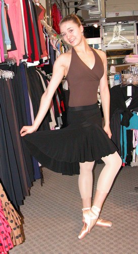 Cecilia is wearing a Black Flared Skirt by Body Wrappers, Style 7641, $39.99; and a Halter Leotard from the Premiere Collection by Body Wrappers, Style P802, $48.99. Available at <a href='http://www.onstagedancewear.com'>OnStageDancewear.com</a>.
