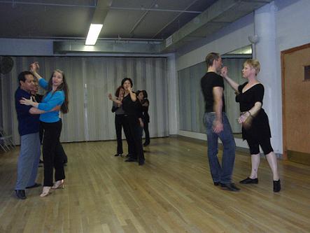 Jules Helm demonstrating a routine in Advanced International Cha Cha class.