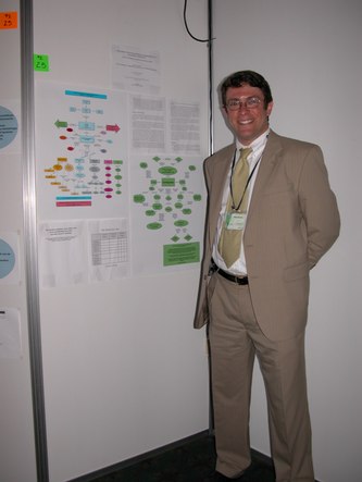 Robert Abrams with his poster, 'Teaching Concept Mapping as Assessment to Teacher Candidates - Some Successes and a Proposal for Next Steps'