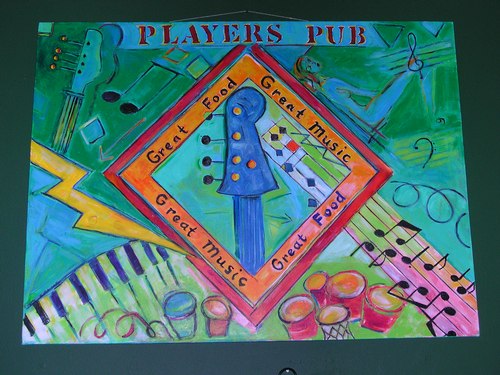Great Food Great Music: mural on the wall above Players Pub dance floor (Carol Miller created the murals for Players Pub)