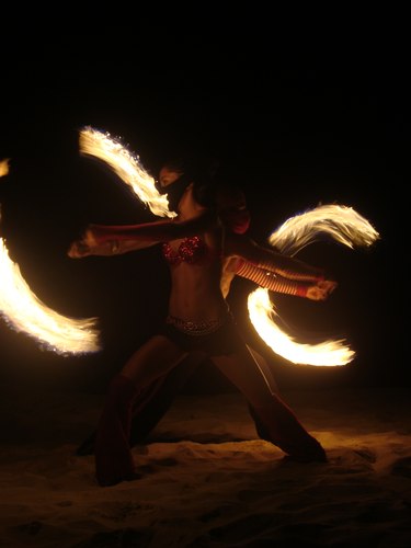 Fuego Rojo dancers entertain people nightly on the beach